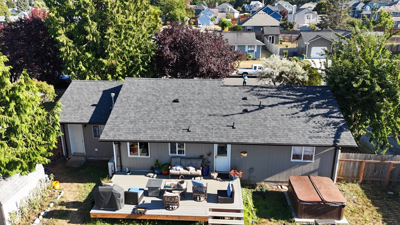 Wind Proof Roofing’s Malarkey Vista AR roof in Midnight Black on a home in Anacortes, Washington