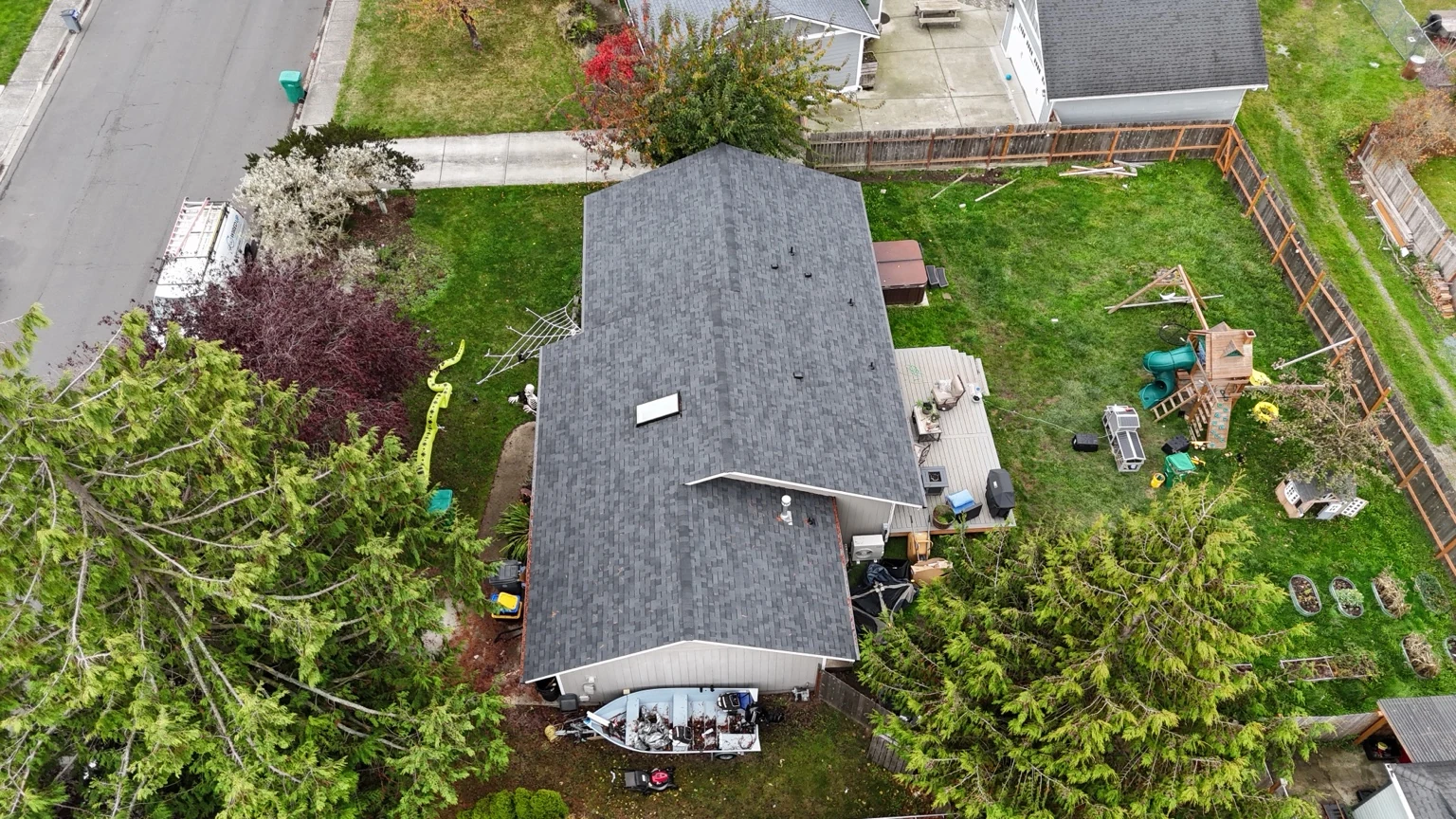 Elevated view along the Malarkey Vista AR roof and skylight at the Rockridge project in Anacortes